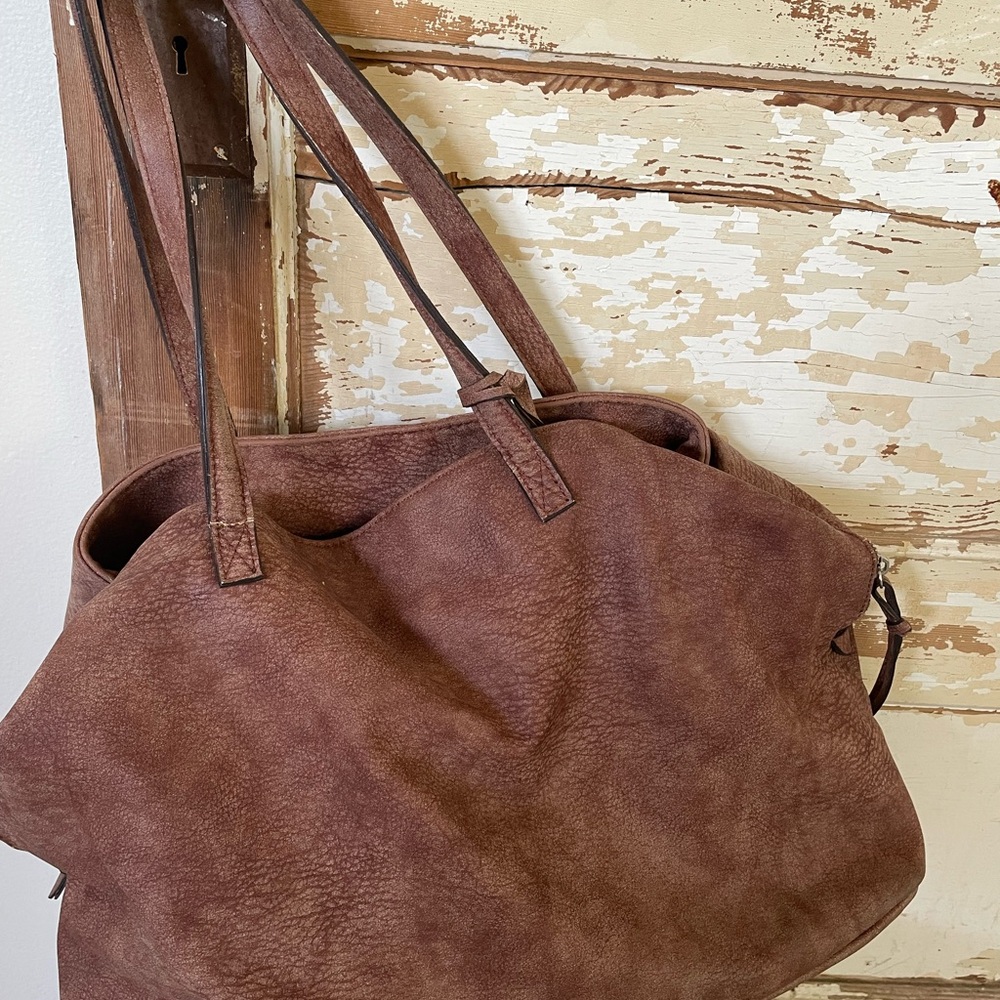 Beautiful free people bag comes with an extra strap wallet
